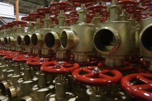 Stack of brass valves in Wilson and Cousins Burlington Warehouse